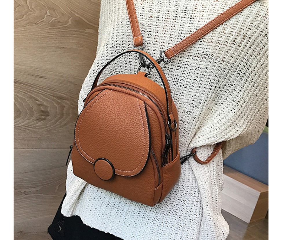 Women's Round Buckle Eco-Leather Backpack Women's Round Buckle Eco-Leather Backpack
