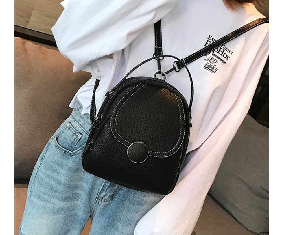 Women's Round Buckle Eco-Leather Backpack Women's Round Buckle Eco-Leather Backpack