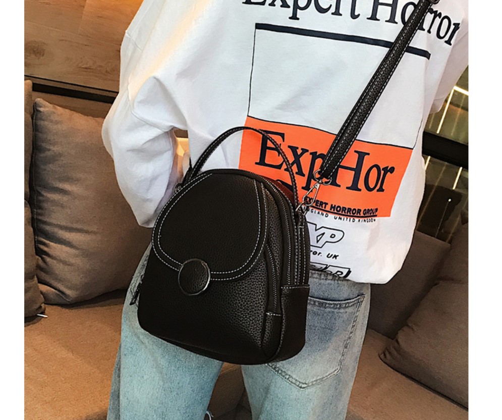 Women's Round Buckle Eco-Leather Backpack Women's Round Buckle Eco-Leather Backpack